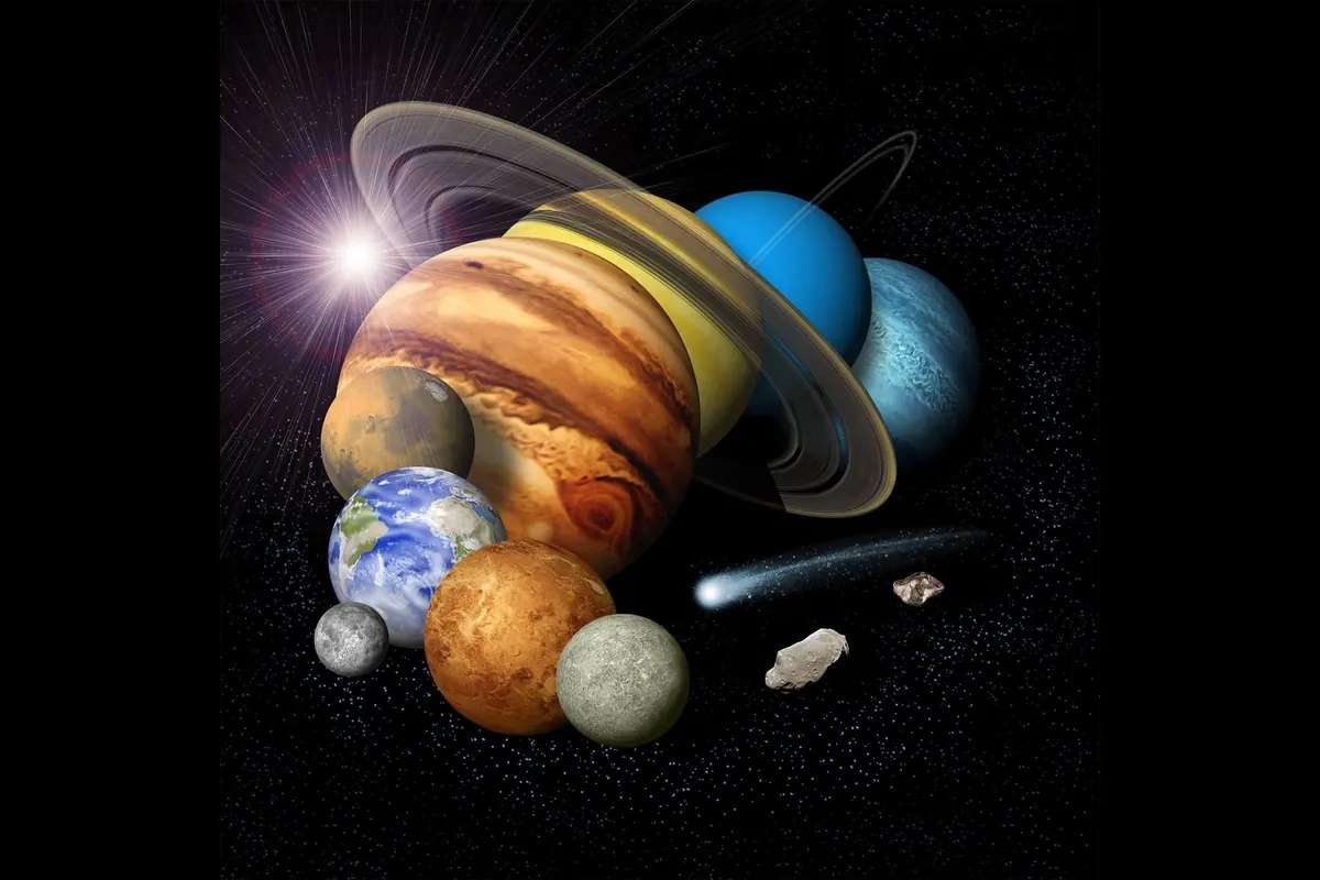 An artist montage of the eight planets, a comet and an asteroid