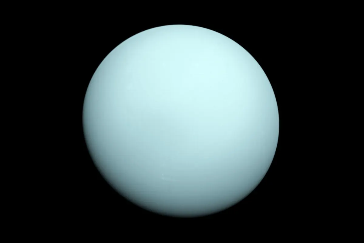 Uranus as a smooth pale blue-green disk